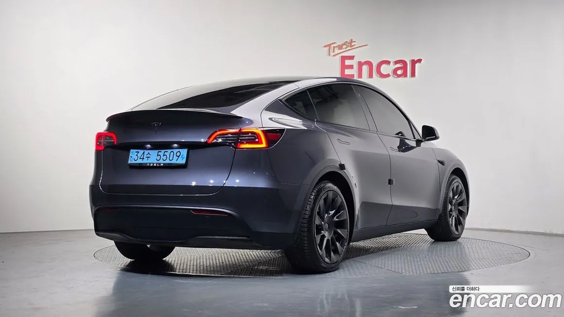 Tesla Model Y — фото 7