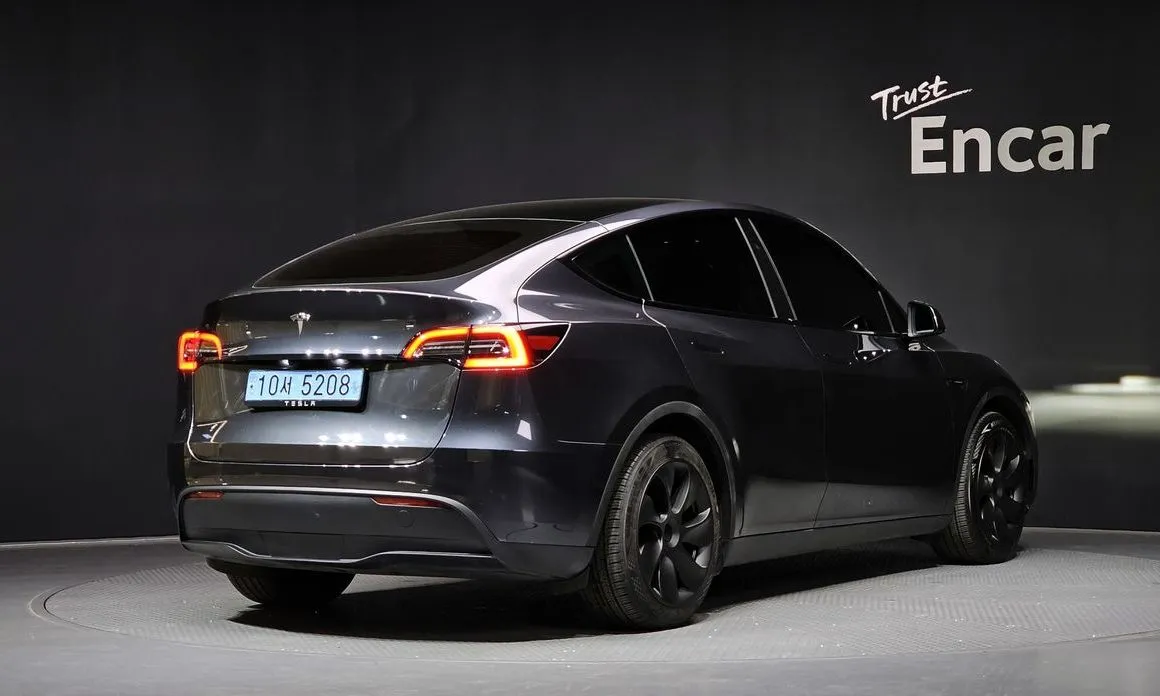 Tesla Model Y — фото 7