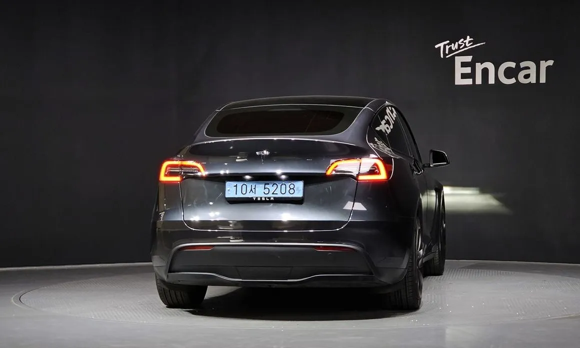 Tesla Model Y — фото 6
