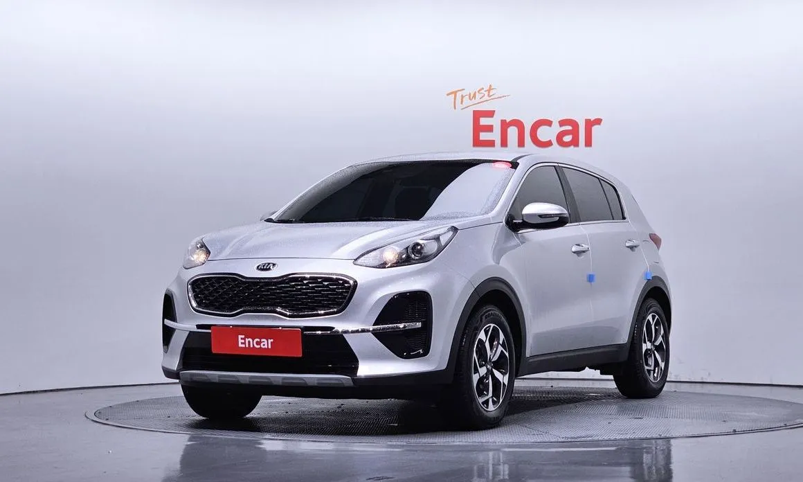 Kia Sportage — фото 1