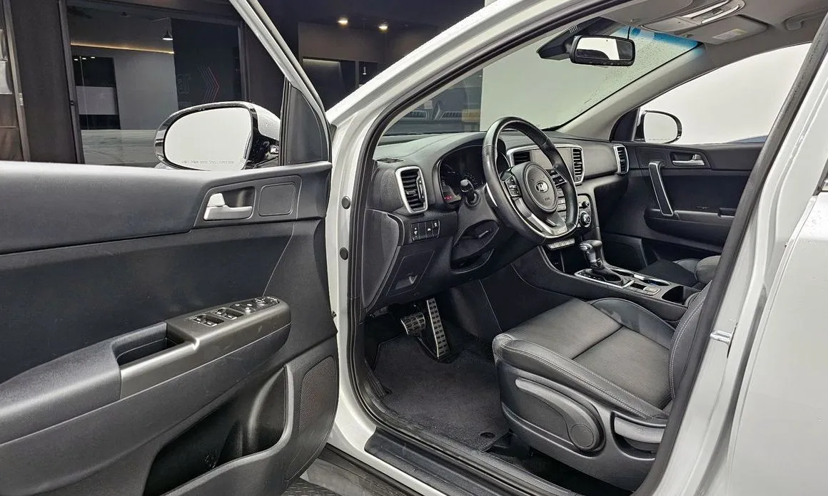 Kia Sportage — фото 9