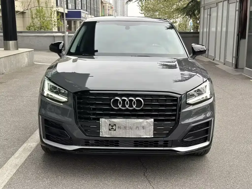 Audi Q2L — фото 10