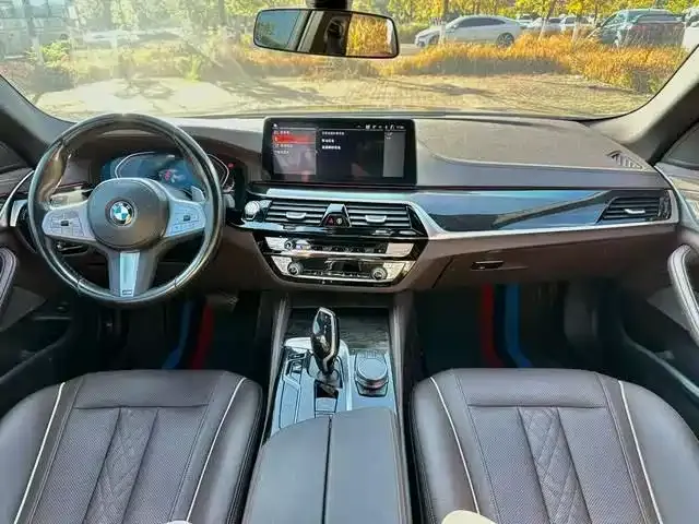 BMW 5 Series — фото 7