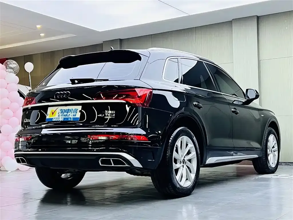 Audi Q5L — фото 6