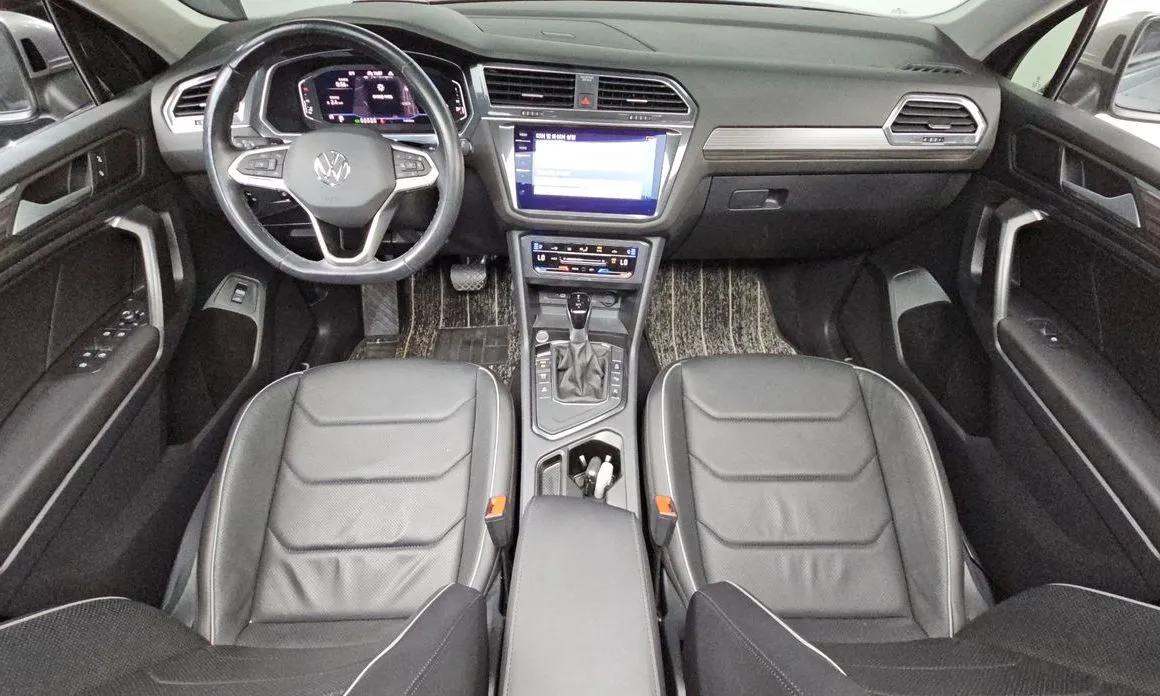 Volkswagen Tiguan — фото 9