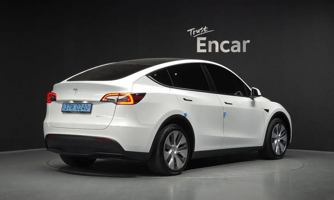 Tesla Model Y — фото 7