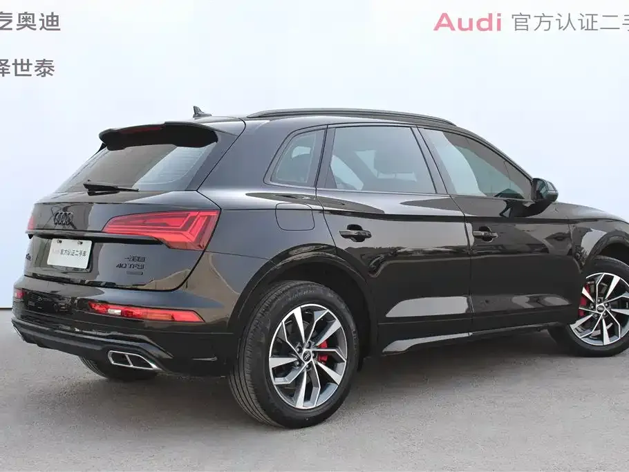 Audi Q5L — фото 10