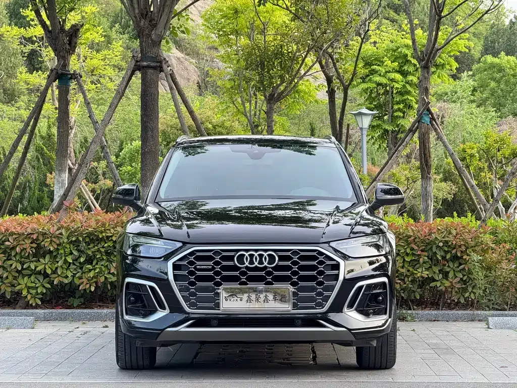 Audi Q5L — фото 8