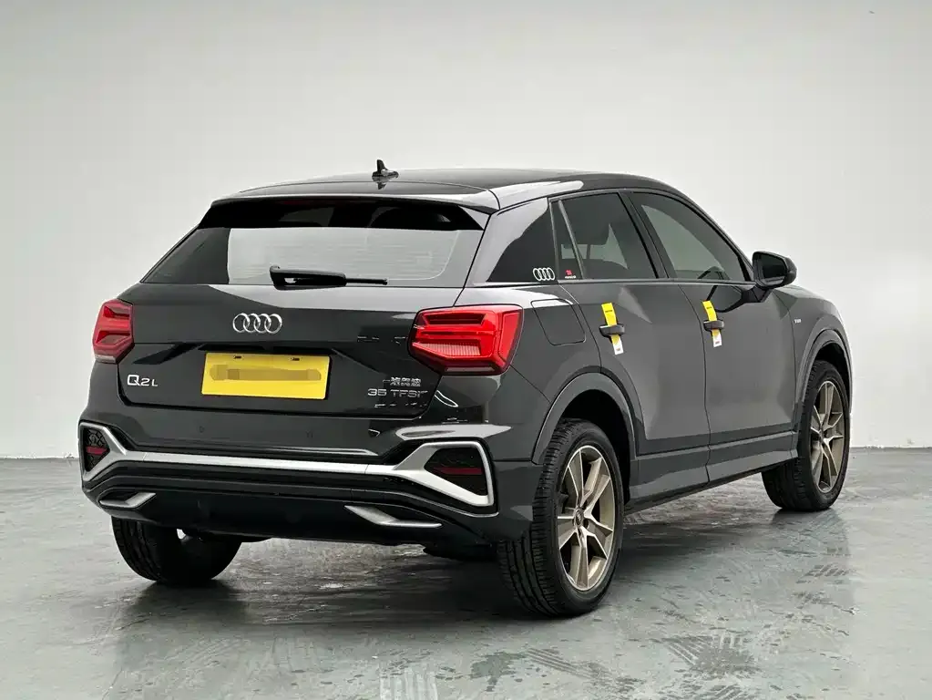Audi Q2L — фото 6