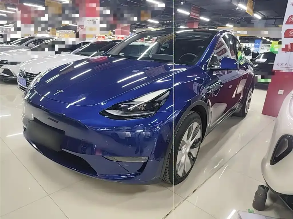 Tesla Model Y — фото 1