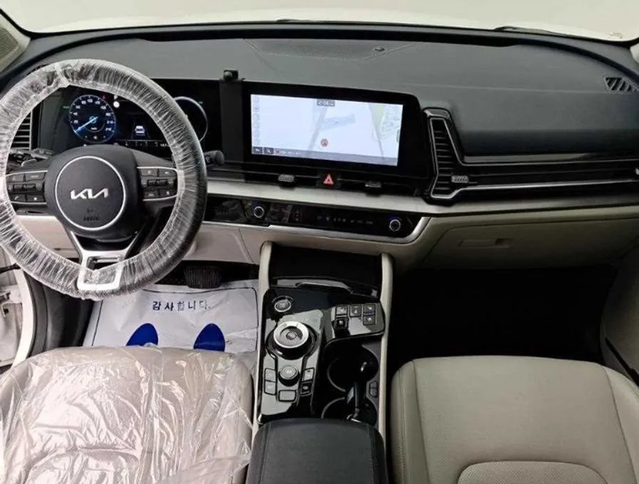 Kia Sportage — фото 9