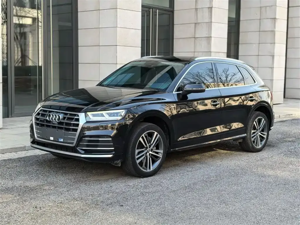 Audi Q5L — фото 9