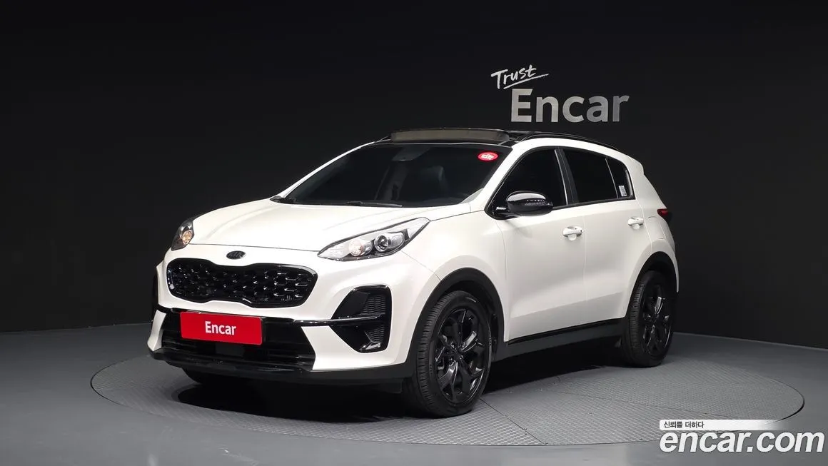 Kia Sportage — фото 1