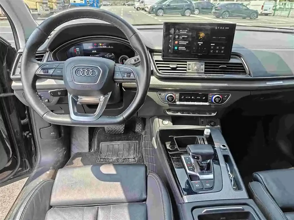 Audi Q5L — фото 5