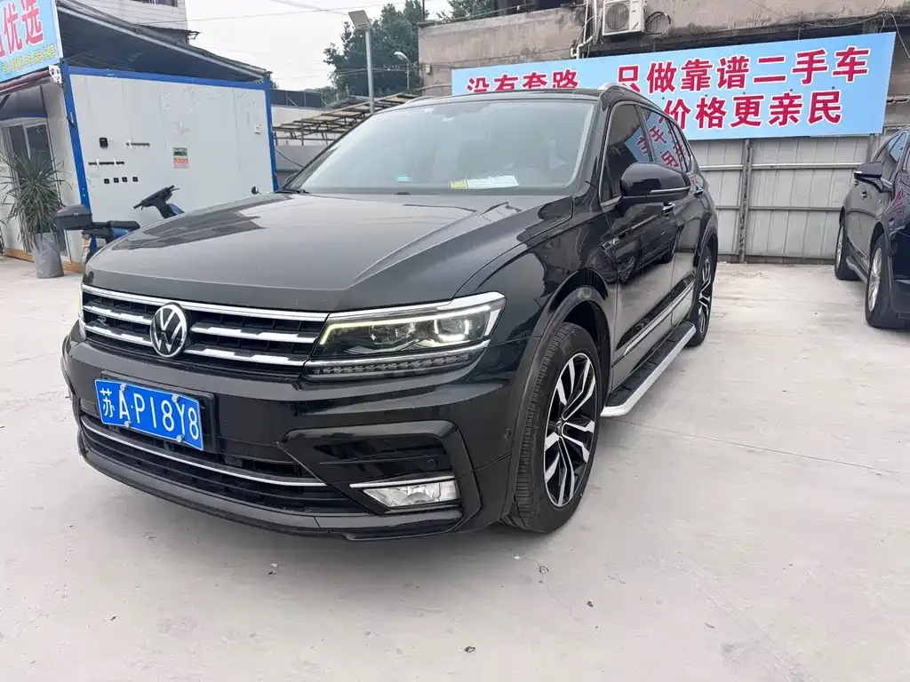 Volkswagen Tiguan L — фото 1