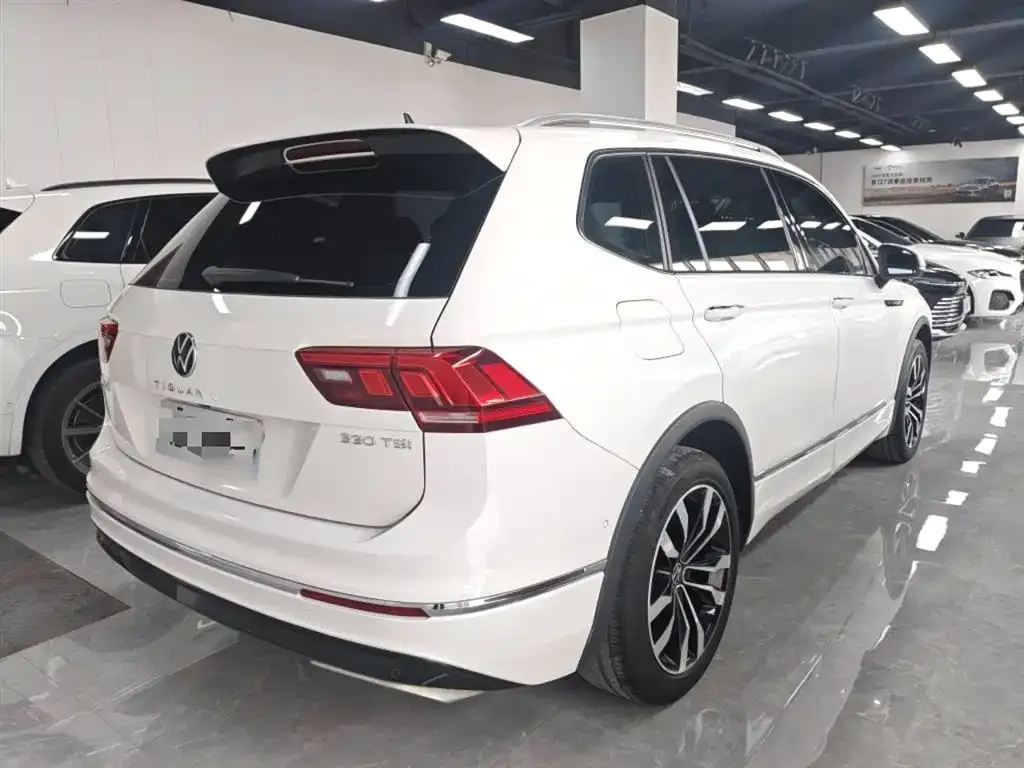 Volkswagen Tiguan L — фото 7