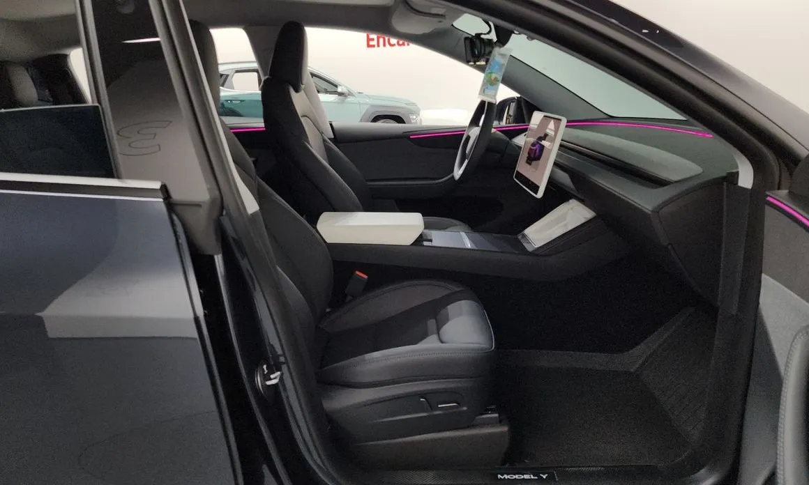 Tesla Model Y — фото 10