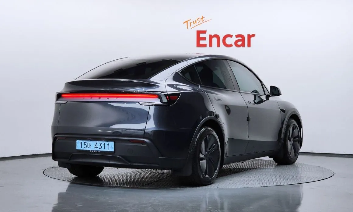 Tesla Model Y — фото 5