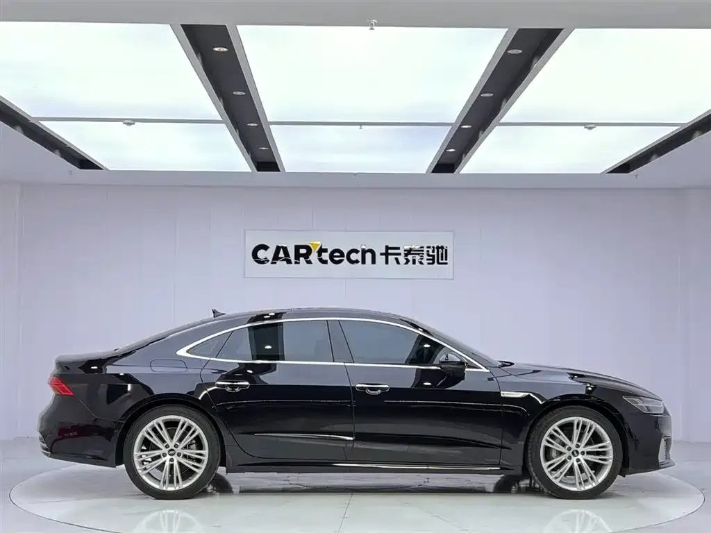 Audi A7L — фото 7