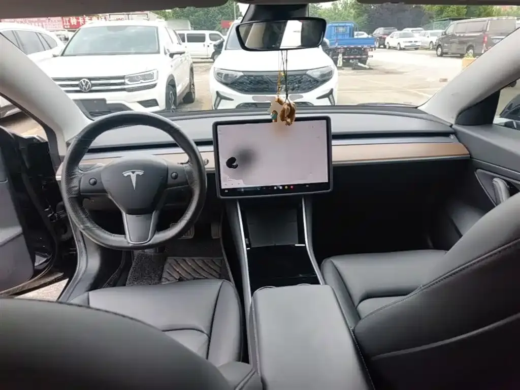 Tesla Model 3 — фото 7