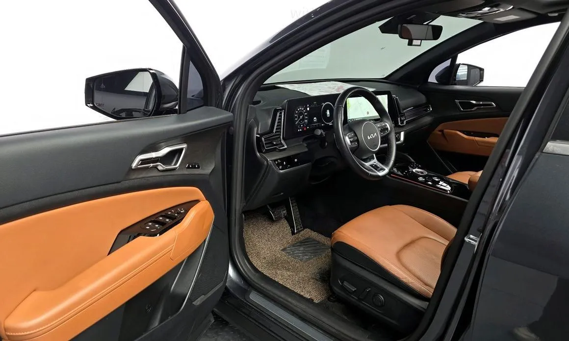 Kia Sportage — фото 10