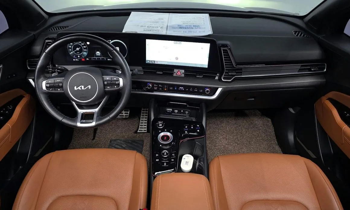 Kia Sportage — фото 9