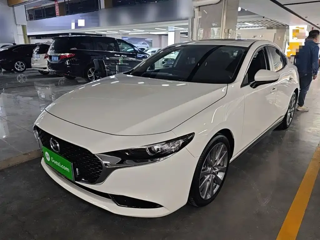 Mazda 3 Axela — фото 1