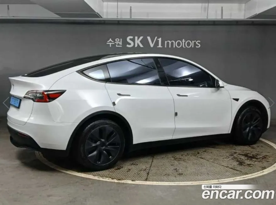 Tesla Model Y — фото 6