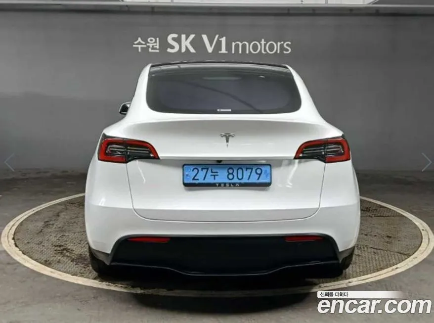 Tesla Model Y — фото 8