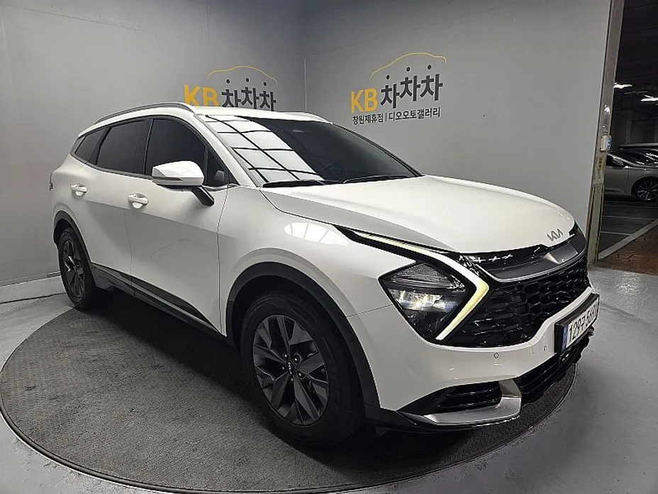 Kia Sportage — фото 7