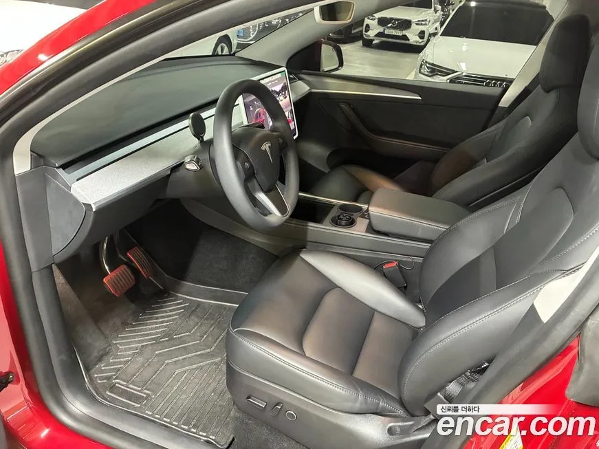 Tesla Model Y — фото 10