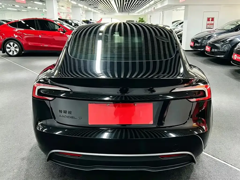 Tesla Model 3 — фото 5