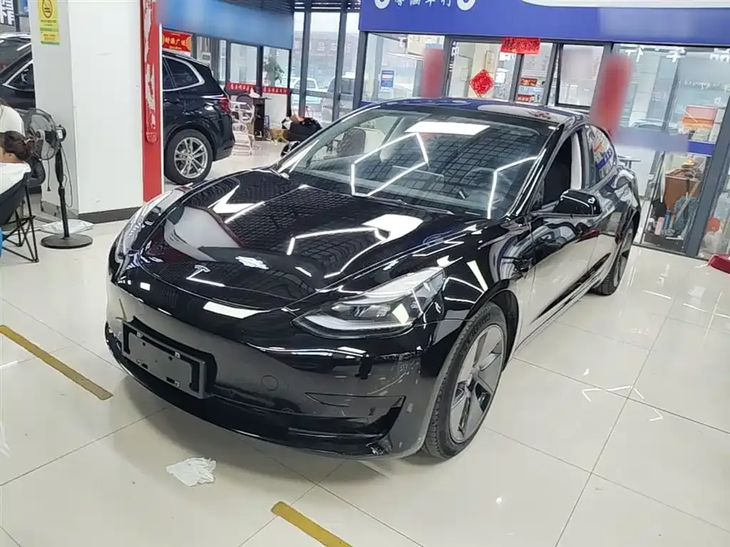 Tesla Model 3 — фото 7