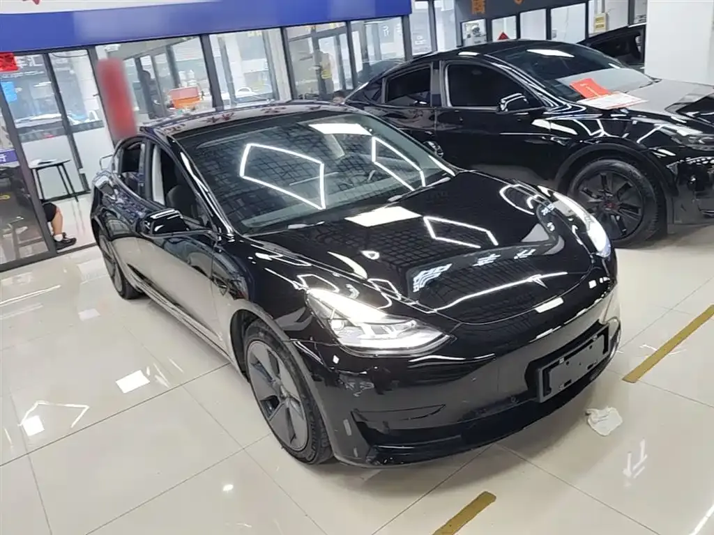 Tesla Model 3 — фото 9