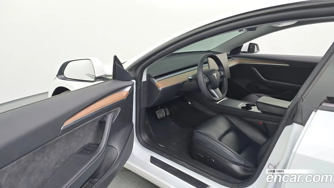 Tesla Model 3 — фото 10