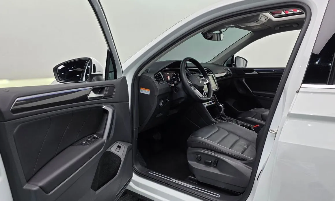 Volkswagen Tiguan — фото 6
