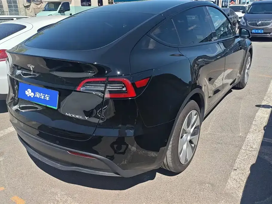 Tesla Model Y — фото 6