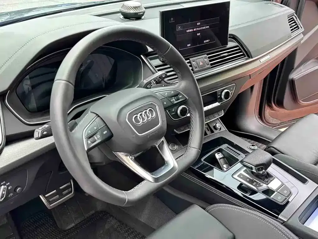 Audi Q5L — фото 7