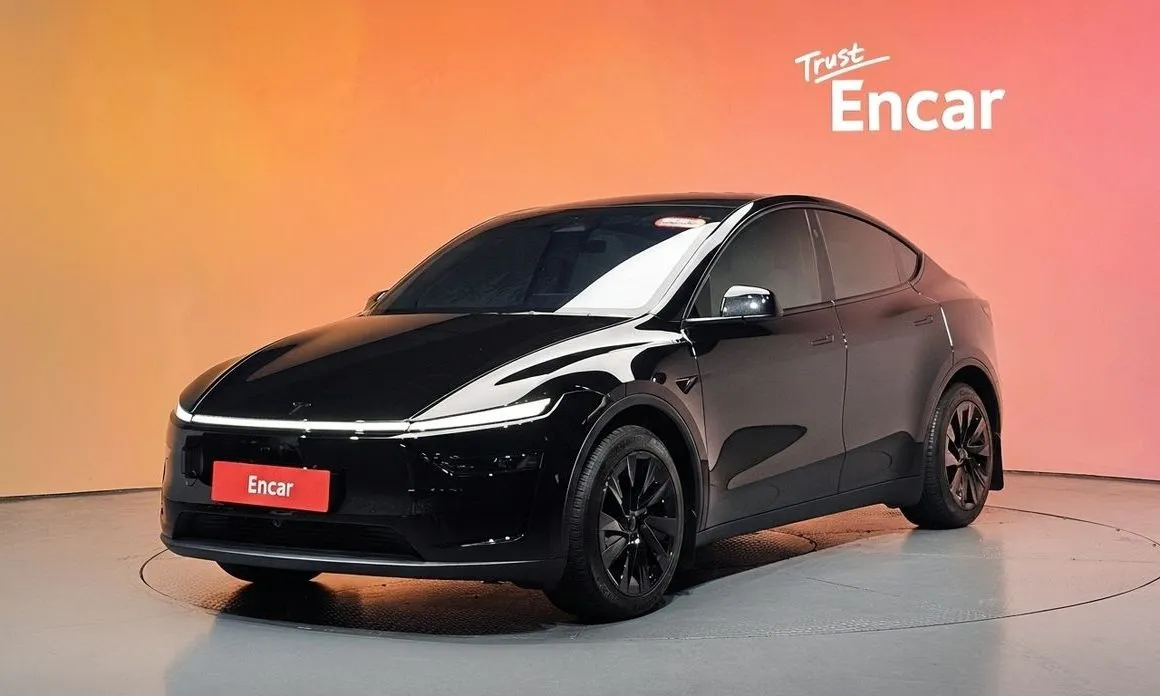 Tesla Model Y — фото 1