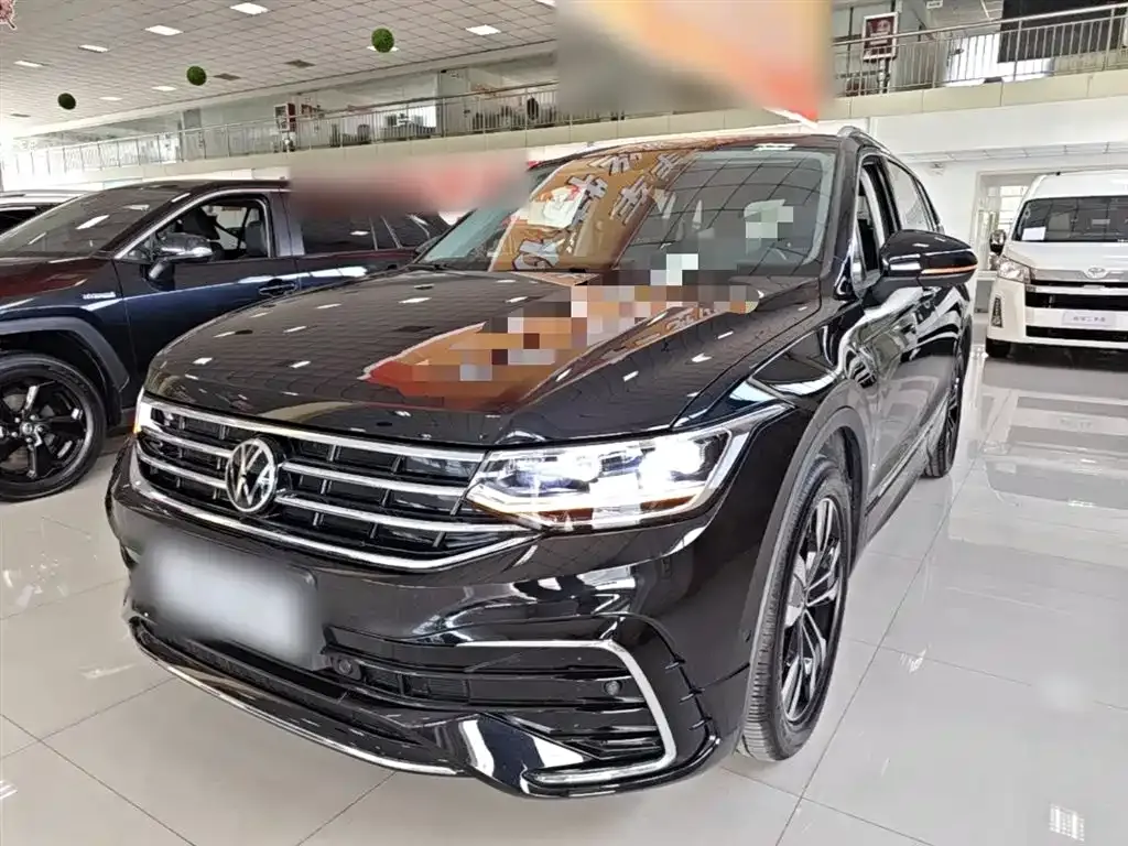 Volkswagen Tiguan L — фото 7