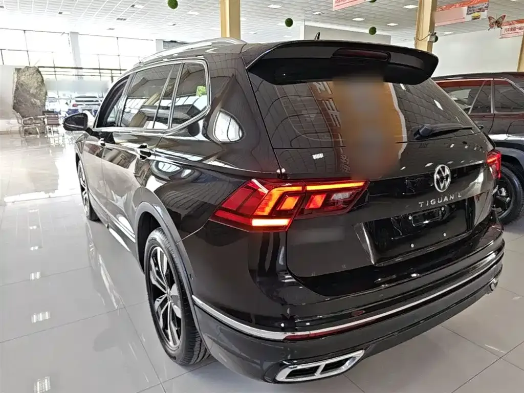 Volkswagen Tiguan L — фото 2