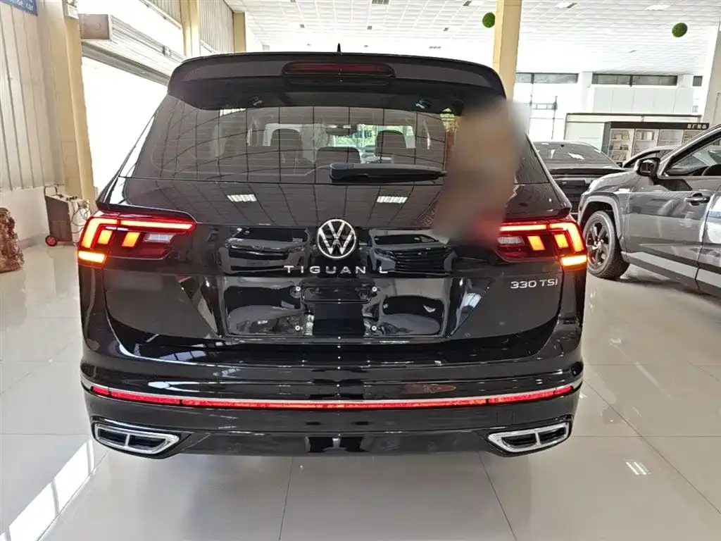 Volkswagen Tiguan L — фото 3