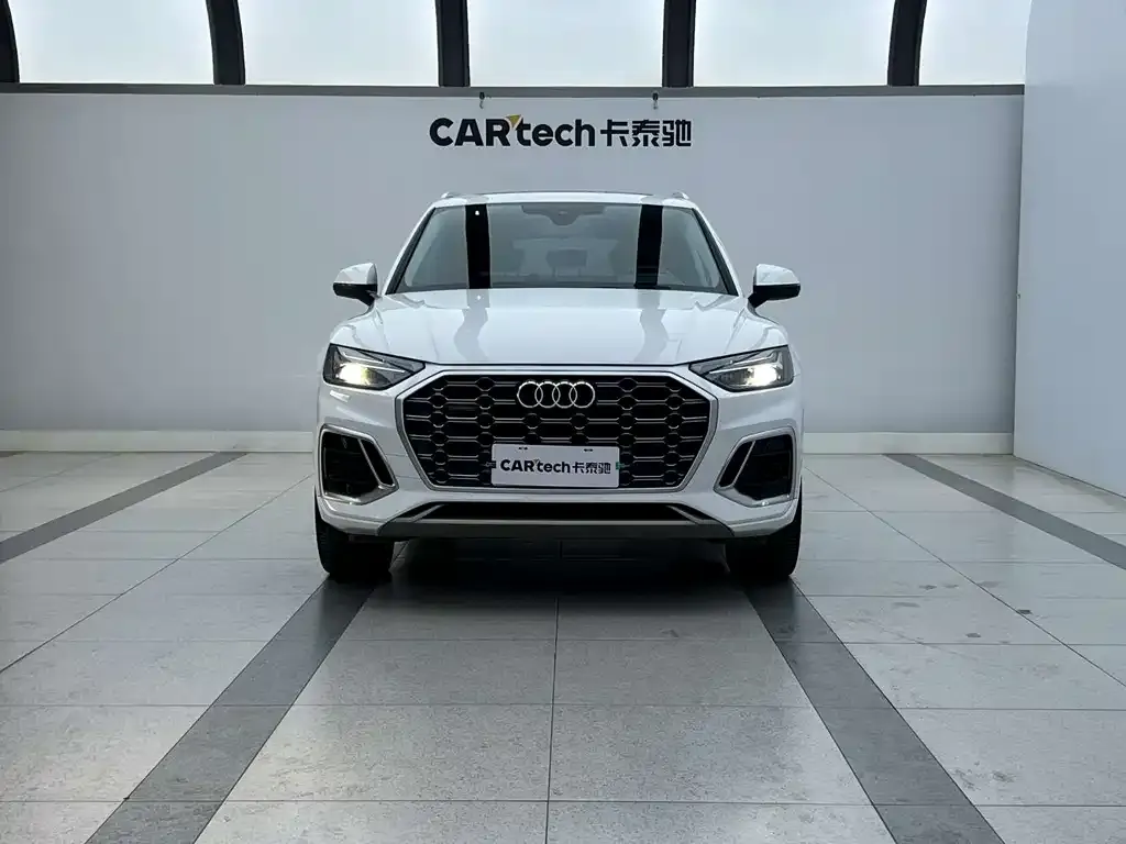 Audi Q5L — фото 7
