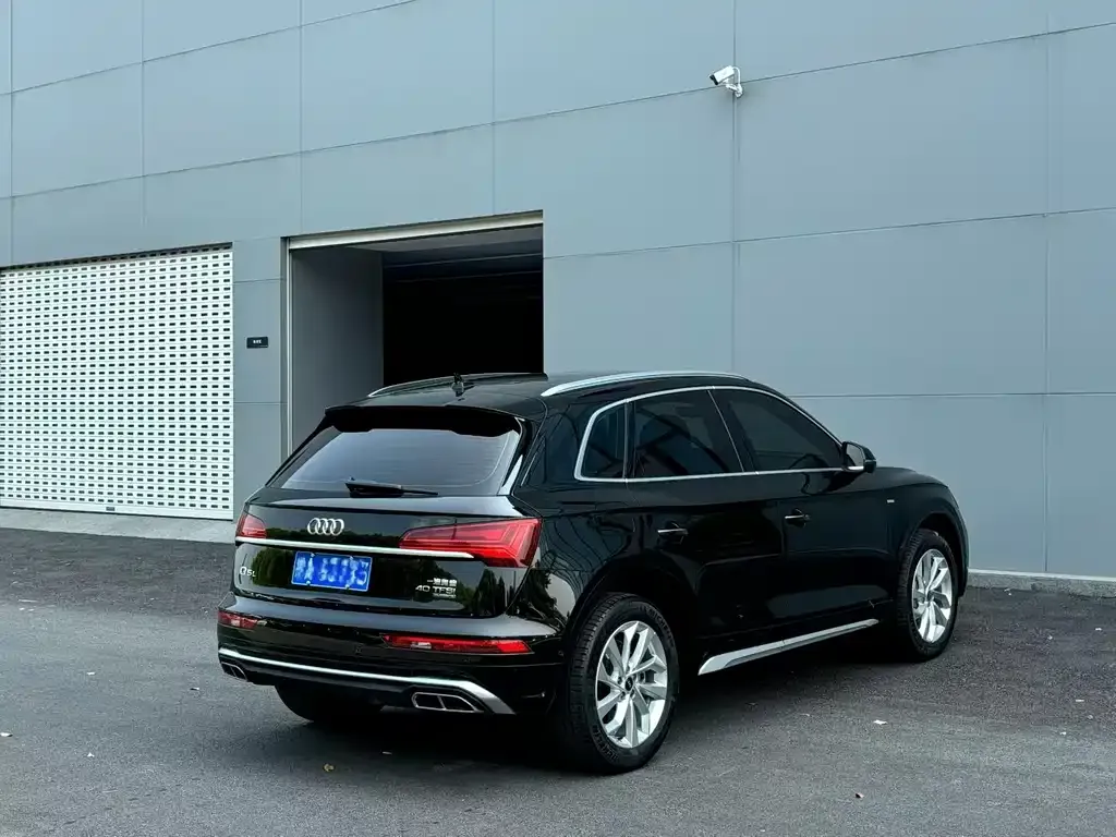 Audi Q5L — фото 7