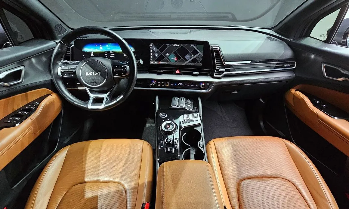 Kia Sportage — фото 10