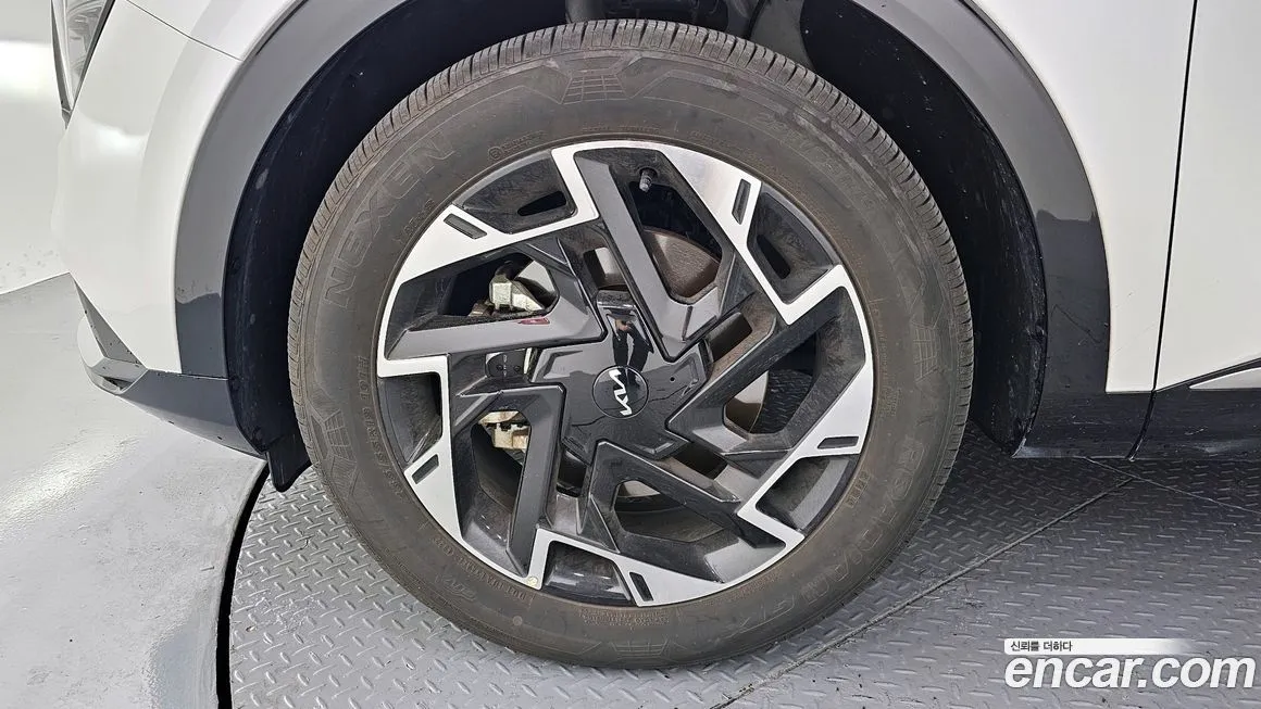 Kia Sportage — фото 9