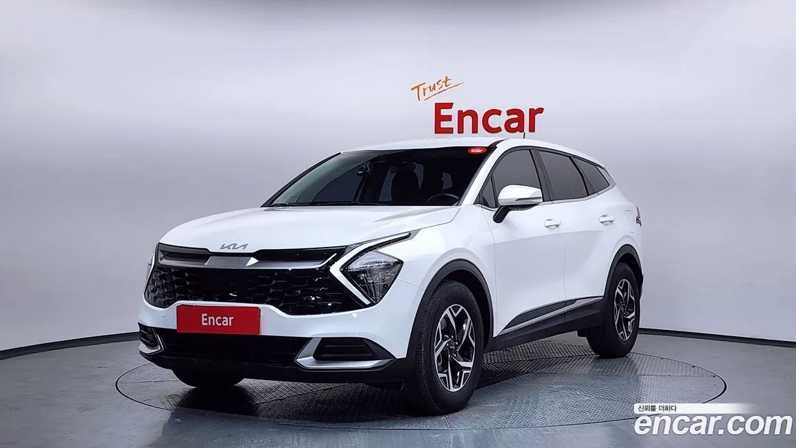 Kia Sportage — фото 1