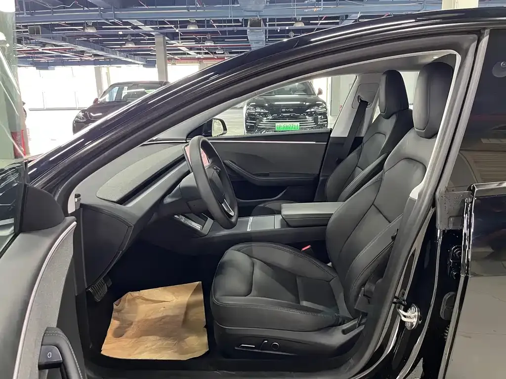 Tesla Model 3 — фото 6