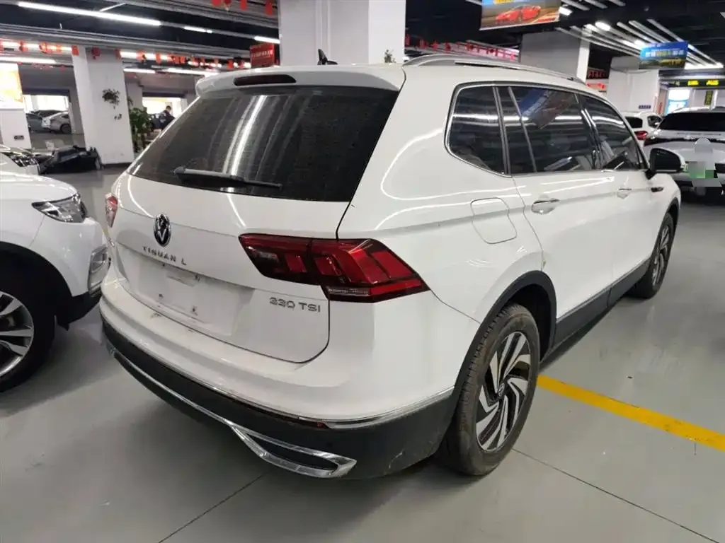 Volkswagen Tiguan L — фото 7