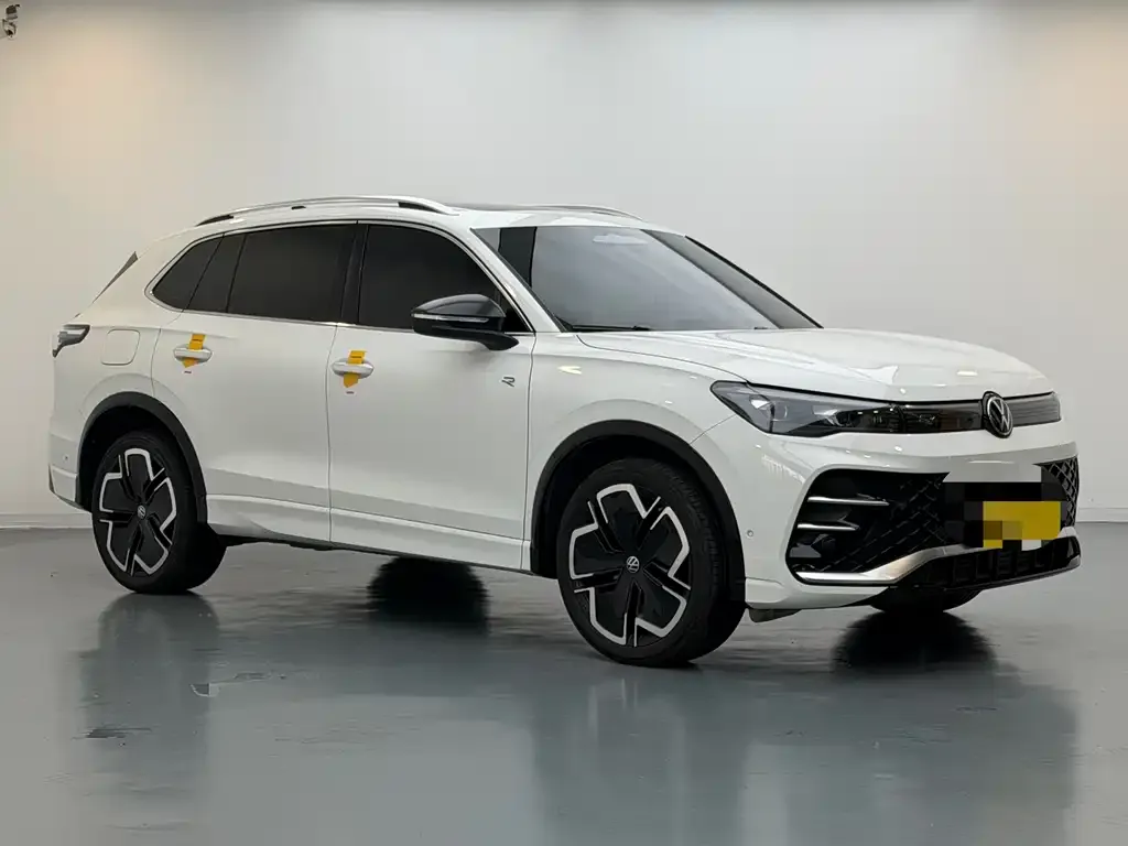 Volkswagen Tiguan L — фото 3
